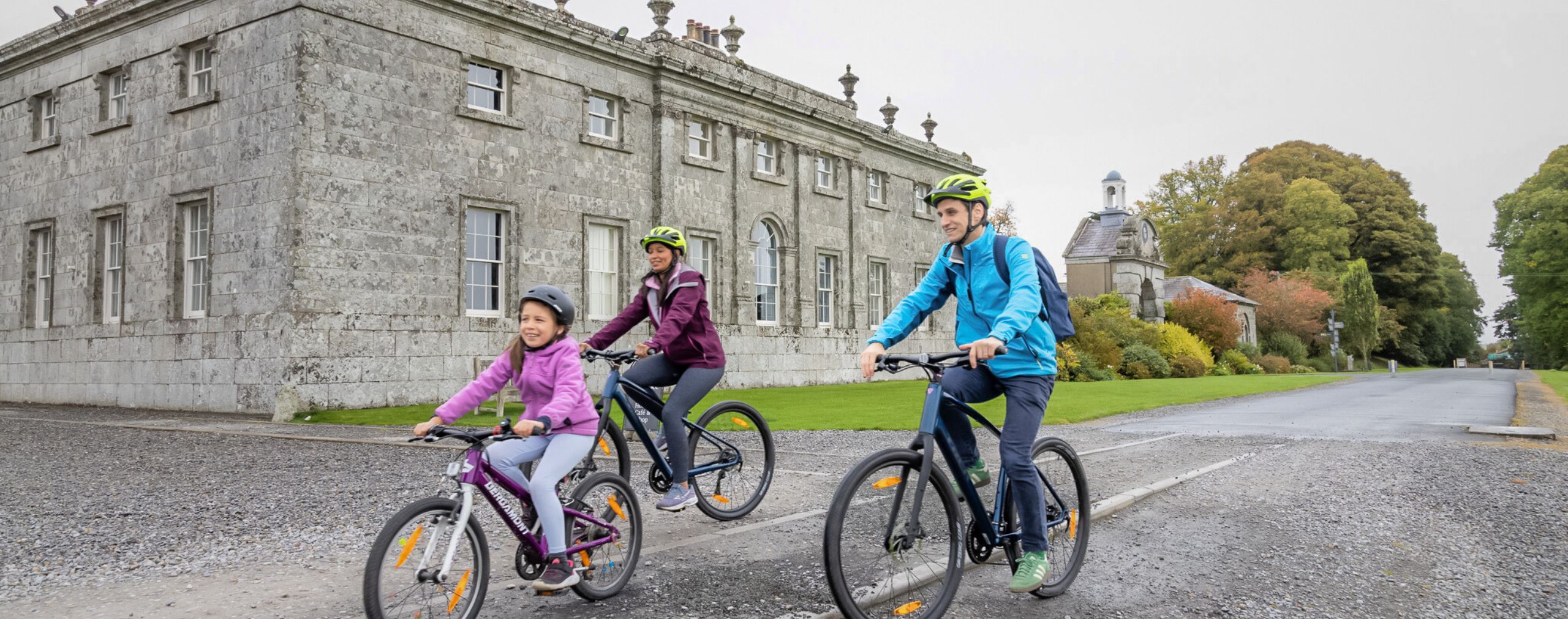 family on bicycles at russborough house